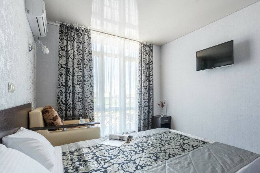 Фотографии номера 2 взрослых + 2 детей в Отеле Омега Витязево